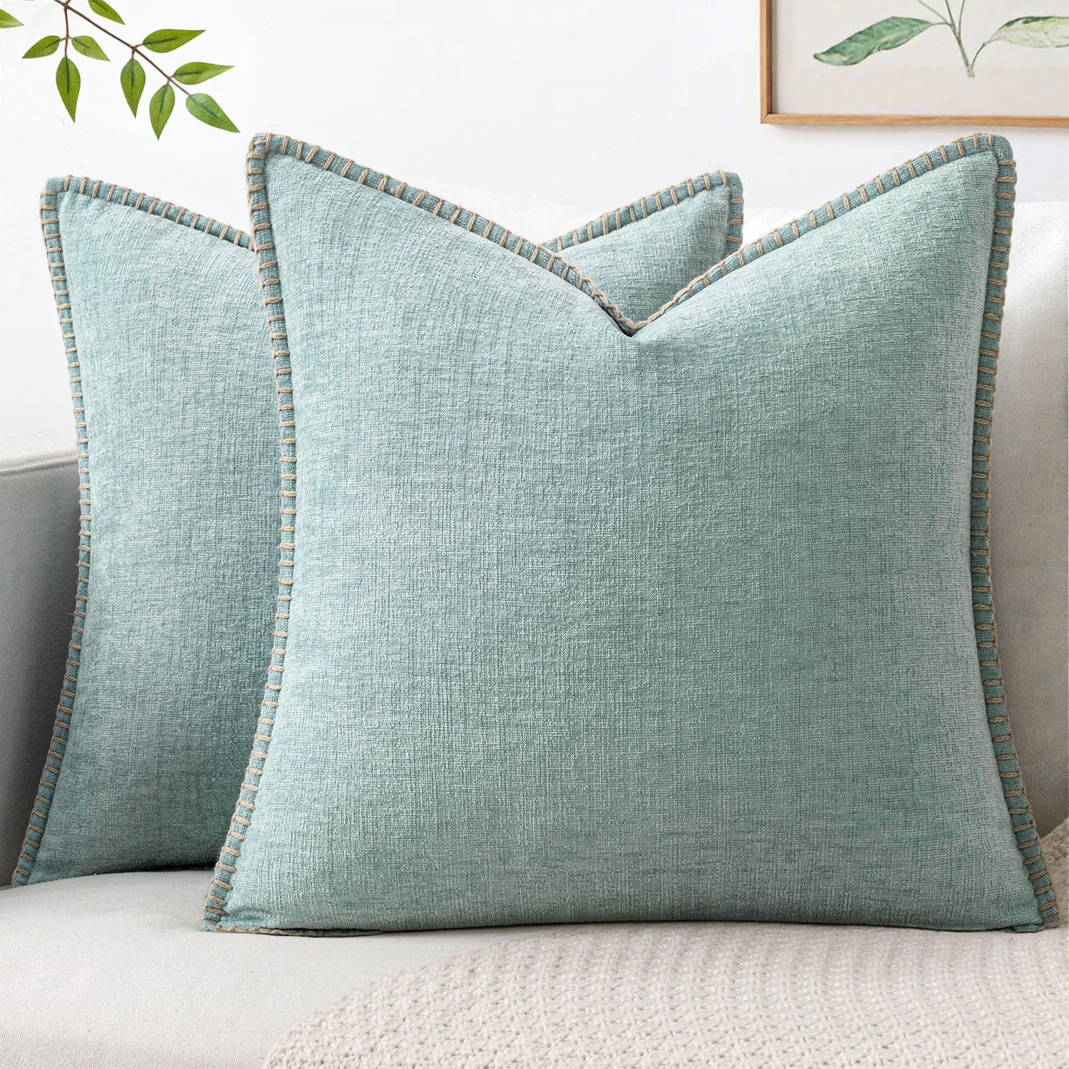 Light blue stitched edge pillow covers
