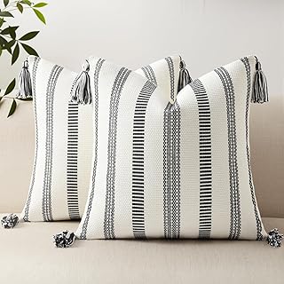 Cream and black throw pillows